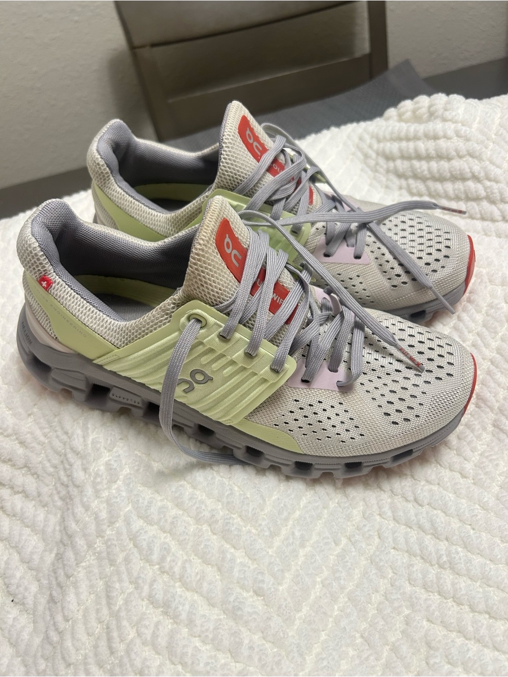 On Running Athletic Shoes in Light Gray and Pale Green with Red Accents